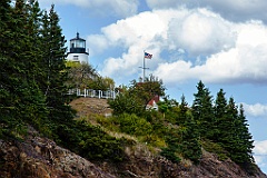 Owls Head Lighthouse Over Rocky Cliffs in Midcoast Maine